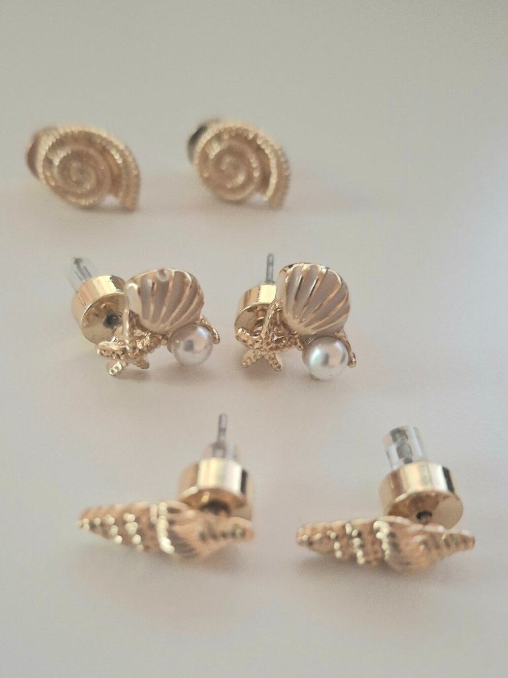 Set of 3 goldtone shell earrings